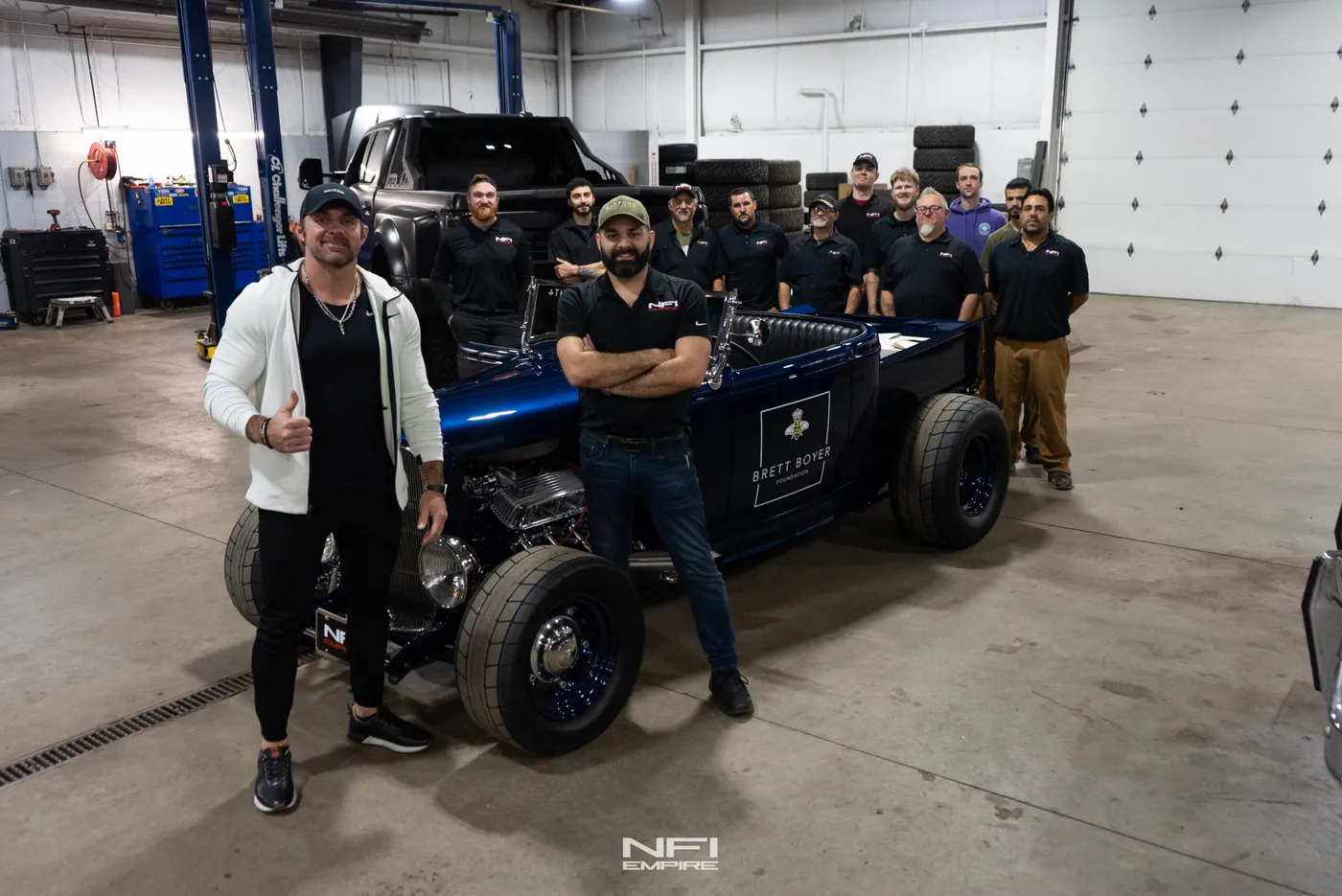 The NFI Empire team with the finished 1932 Ford Roadster charity build